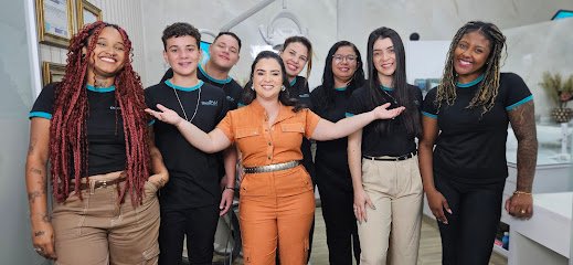 ODONTOMAX - Nathália Duarte (CRO-40548) - Implante, Aparelho, Clareamento, Prótese